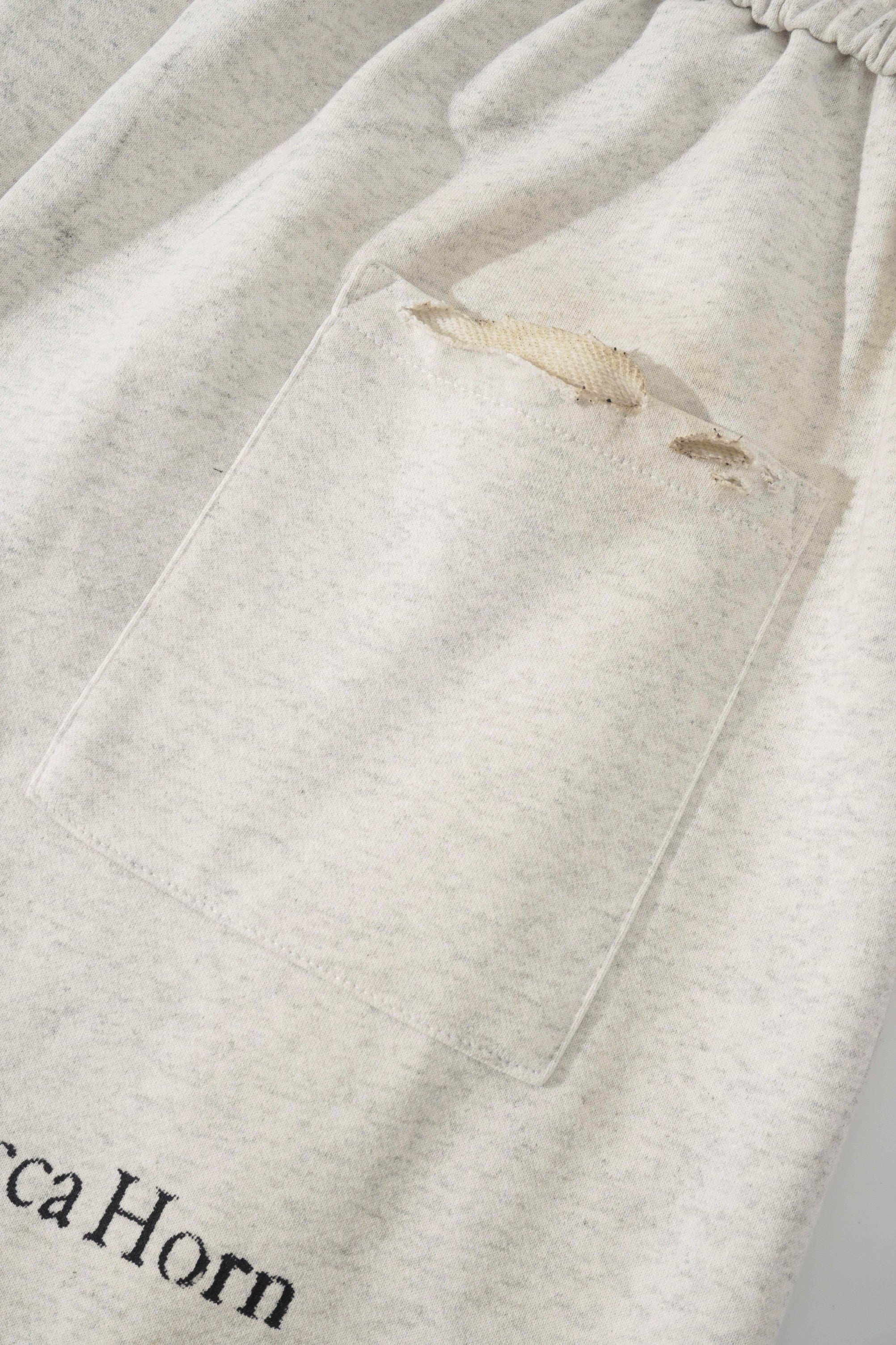 SMILEANDSAD Remake Curved-Leg Sweatpants - Hand-Scorched  Deconstructed
